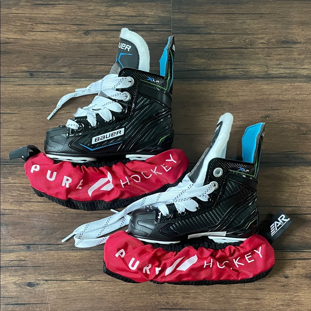 Bauer Black and White Skates with Red Covers